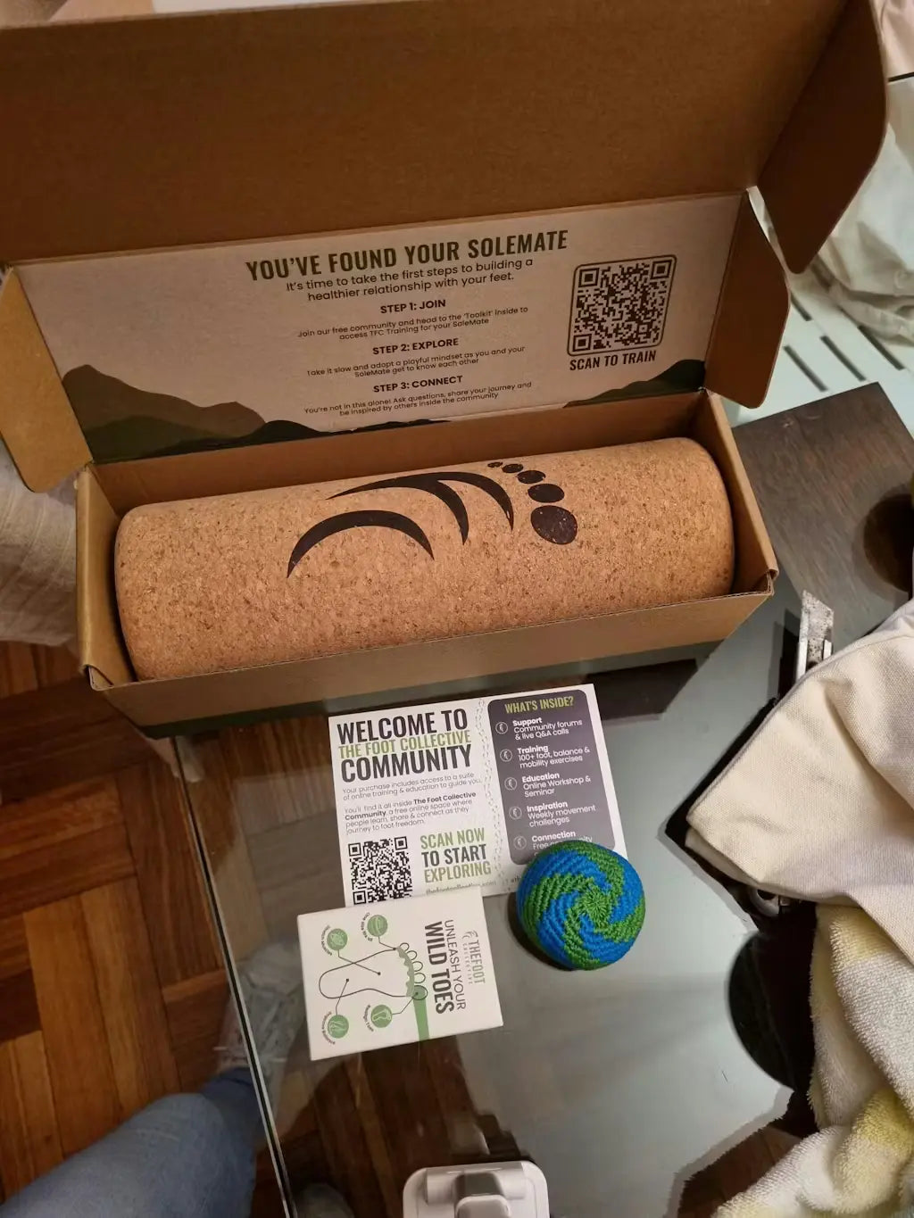 SoleMate Kit unboxing with cork foot roller toe tools and training materials inside box