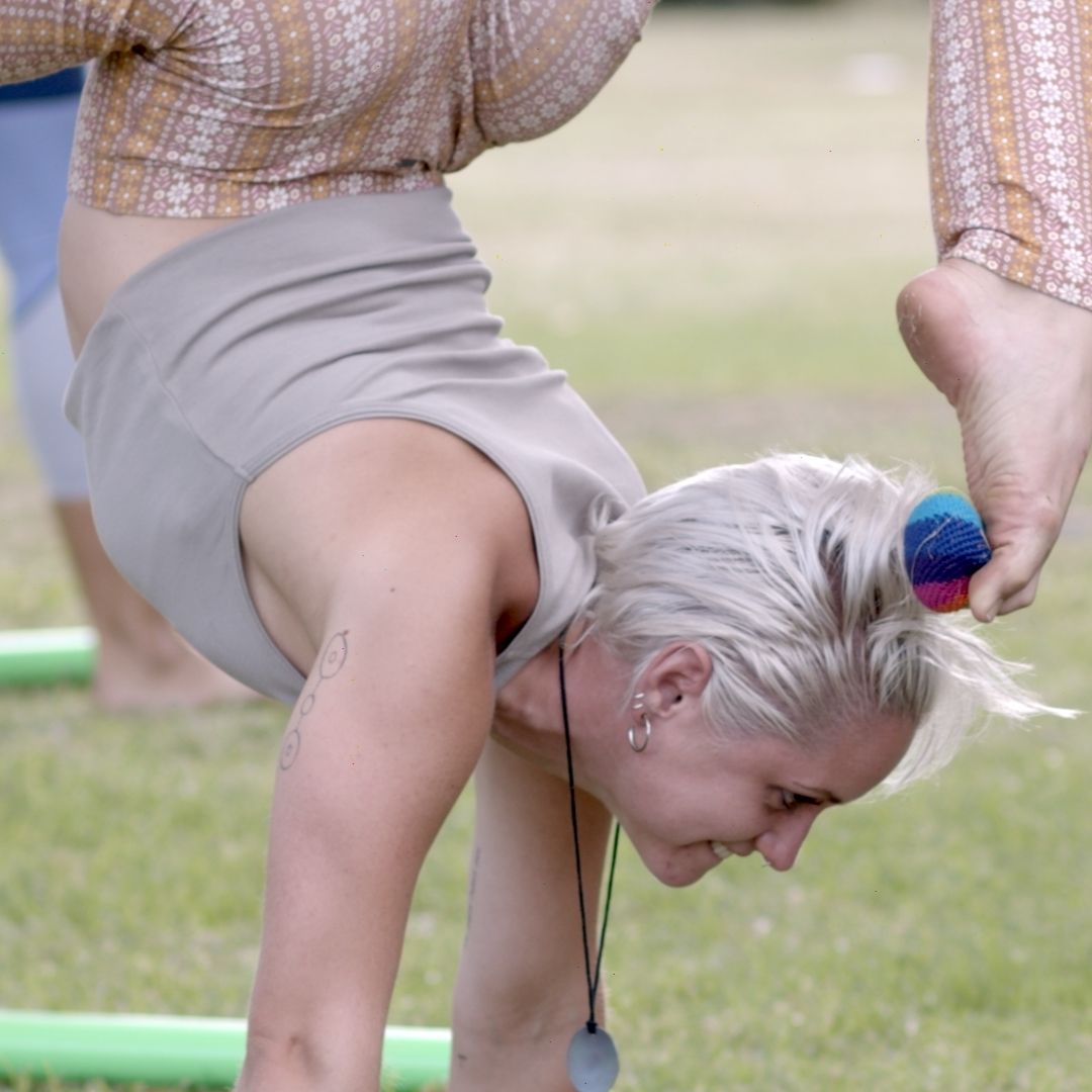 Using a TFC hacky sack whilst doing a handstand